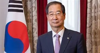 Image of Han Duck-soo: A Steady Hand Navigating South Korea's Future