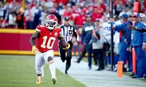 Image of Tyreek Hill: The Cheetah Unleashed - Speed, Skill, and Second Chances